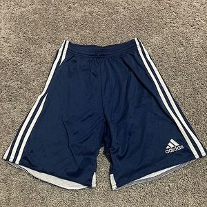 Adidas navy blue soccer shorts.